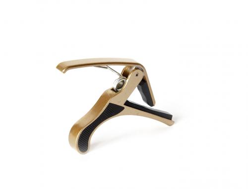 Golden metal guitar Capo isolated on white