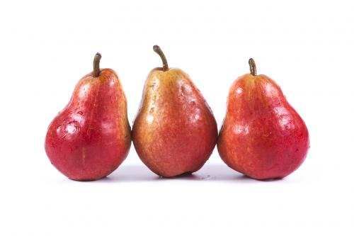 Three ripe red pears isolated on white